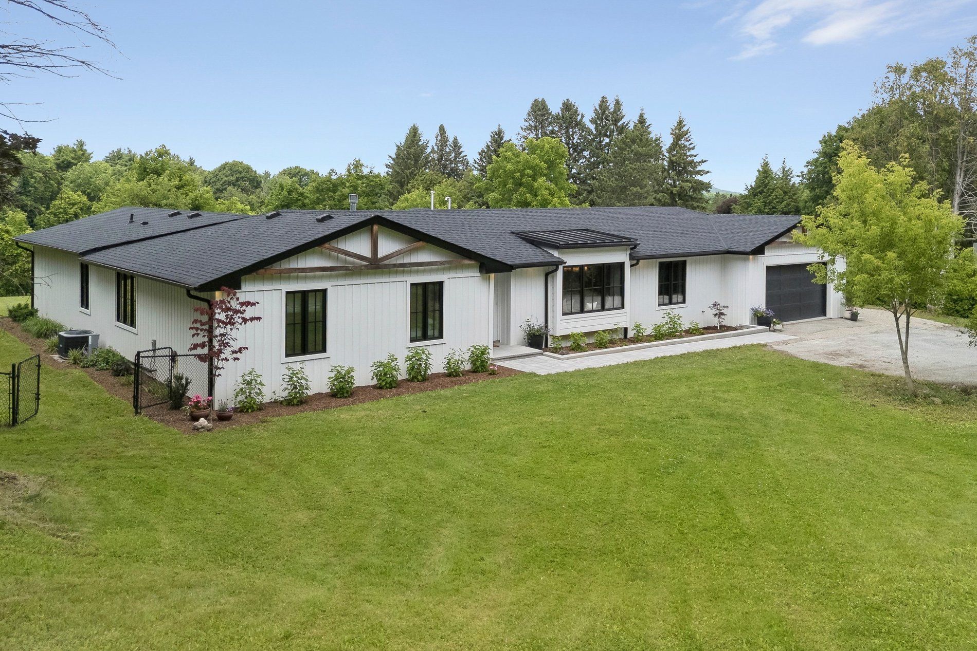 Modern farmhouse on a private acre in Rural Burlington
